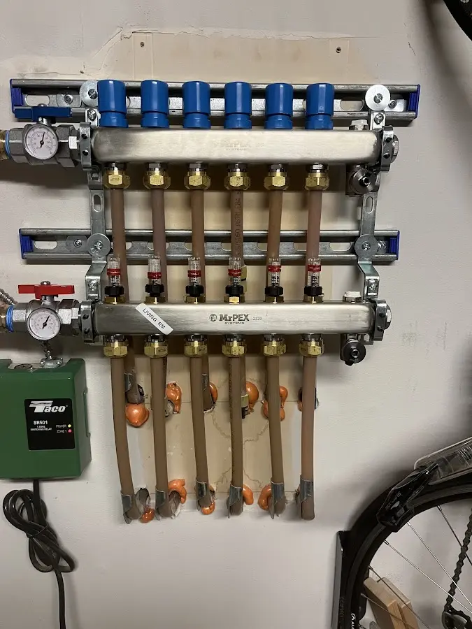 Plumber performing Water Heater Repair at a residential property in James City